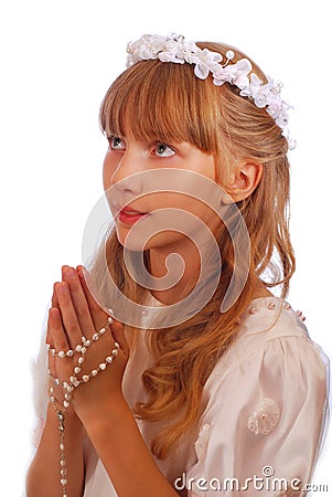 Girl going to the first holy communion Stock Photo