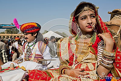 Girl with gold jewelry and traditional dress of India Editorial Stock Photo