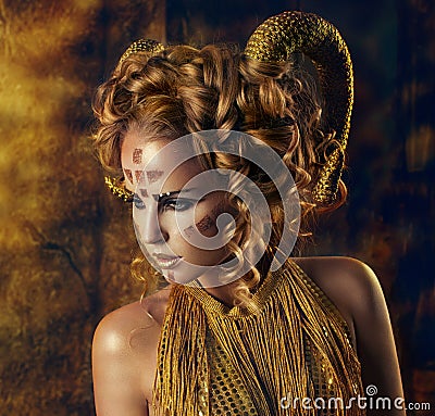 The girl with the Golden horns Stock Photo
