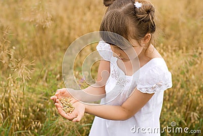 Girl with the grain Stock Photo