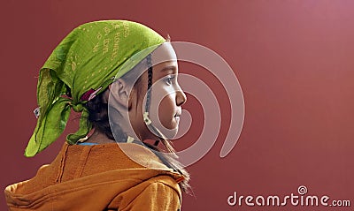 Girl with a green kerchief Stock Photo