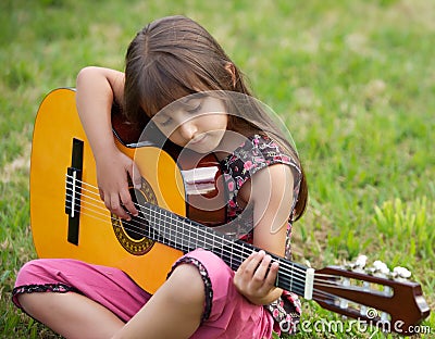 Girl with a guitar Stock Photo