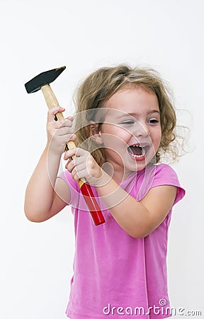 Girl with hammer and smile Stock Photo