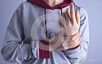 Girl hand bone pain Stock Photo