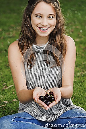 Girl Handful Cherry Smiling Happiness Outdoors Concept Stock Photo