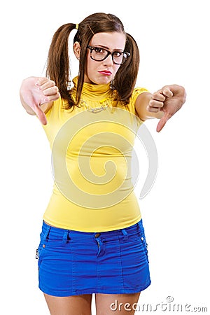 Girl has lowered thumb downwards Stock Photo