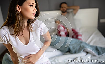 Girl having menstruation suffering from menstrual pain Stock Photo