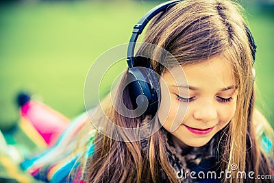 Girl with Headphones Stock Photo