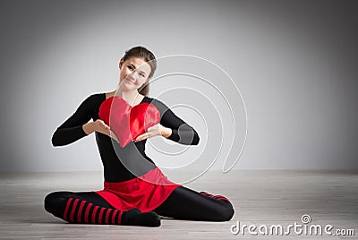 Girl with a heart in his hands Stock Photo