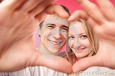 Girl and her boyfriend making heart Stock Photo