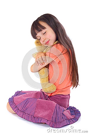 Girl with her favourite toy be Stock Photo