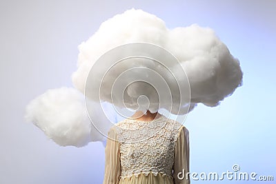 Girl with Her Head in the Clouds Stock Photo