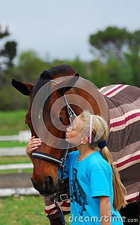 Girl and her horse Stock Photo