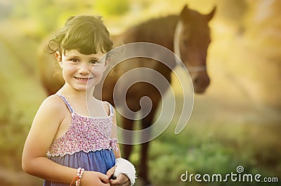 Girl and her horse Stock Photo