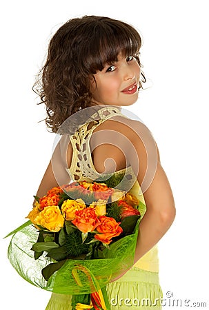 Girl hiding flowers Stock Photo