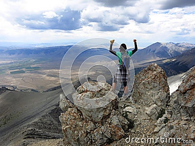 Girl hiker summit mountain top Stock Photo