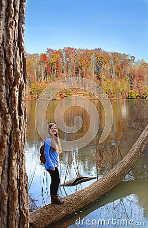 Girl hiking in the forest. Stock Photo