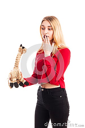 Girl hold toy giraffe isolated Stock Photo