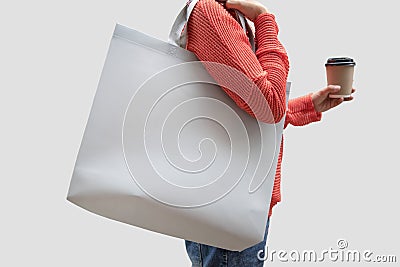 Girl is holding bag canvas fabric for mockup blank template Stock Photo