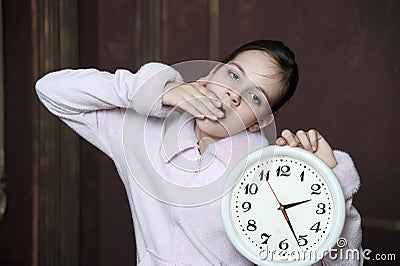 Girl holding big clock Stock Photo