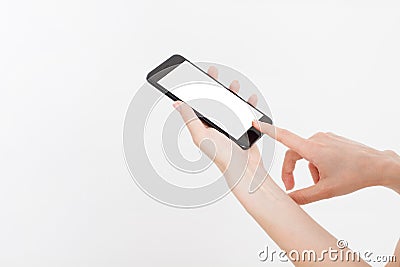 Girl holding black phone. Cellular isolated on white clipping path inside. Top view.Mock up.Copy space.Template.Blank. Stock Photo