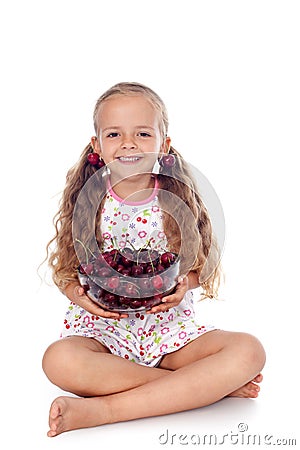 Girl holding a bowl of ripe cherries Stock Photo