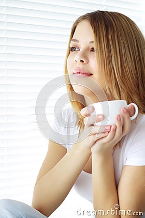 Girl holding coffee cup Stock Photo