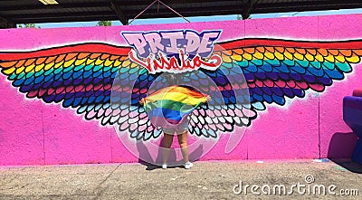 Girl holding flag at LGBTQ pride festival Editorial Stock Photo