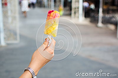 Girl holding fruit ice cream Stock Photo