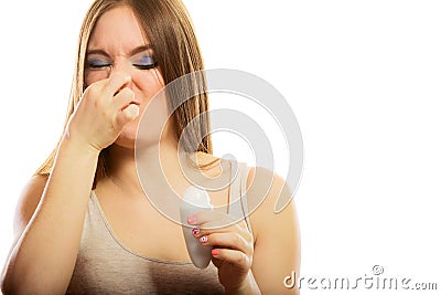 Girl holding stick deodorant in hand Stock Photo