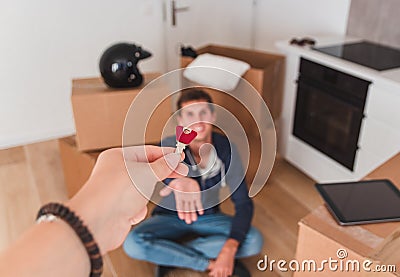 Handing Over the Key from a New Home Stock Photo