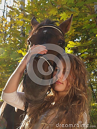 Girl and a horse Stock Photo