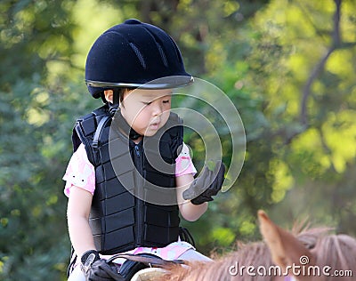 Girl and horse Stock Photo