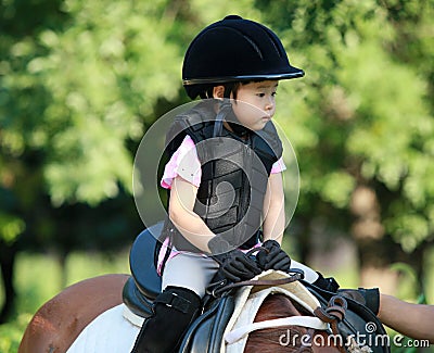 Girl and horse Stock Photo