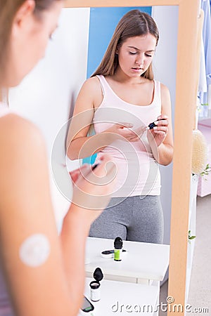 Girl with hypoglycemia Stock Photo