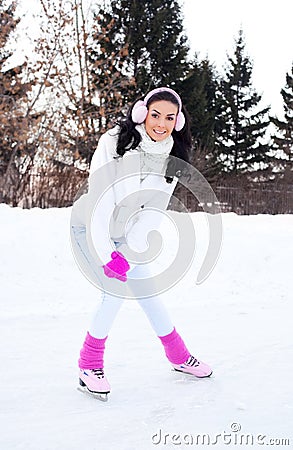 Girl ice skating Stock Photo