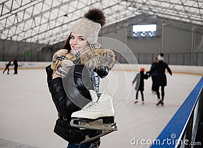 Girl on ice skating rink Stock Photo