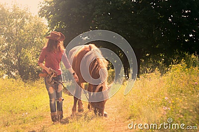 Girl in the image of a cowboy Stock Photo