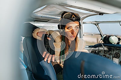 Girl in the image of a pilot Stock Photo