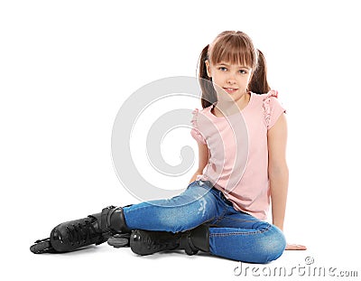 Girl with inline roller skates sitting Stock Photo