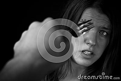 Girl intimidated with a fork Stock Photo