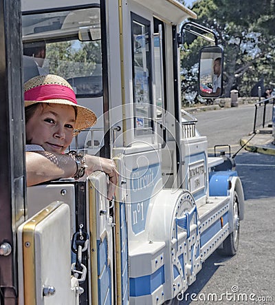 Girl in joyride train Editorial Stock Photo