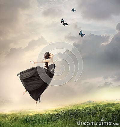 Girl Jumping in the Air Stock Photo