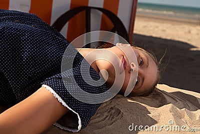 Girl sun sand beach, De Panne, Belgium Stock Photo