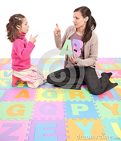 Girl learning phonics alphabet abc Stock Photo