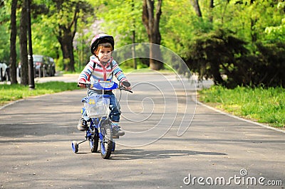 Girl learning to ride bike Stock Photo