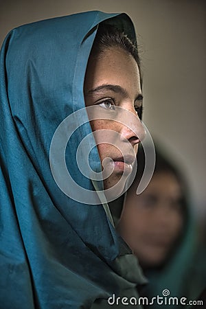 Girl learning in the only school in the village of Shimshal 3100m is a government school taught by teachers based in the village Editorial Stock Photo