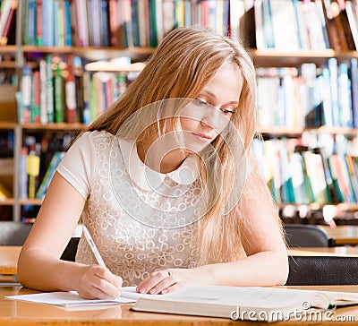 Girl learns lessons before the exam Stock Photo