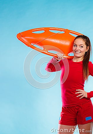 Girl lifeguard with equipment float Stock Photo