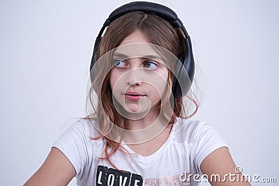 Girl listening a music on headphone Stock Photo